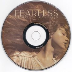 a cd disc with an image of a woman's face and hair blowing in the wind