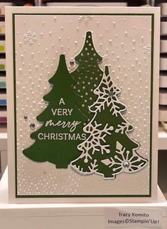 a very merry christmas tree card on display