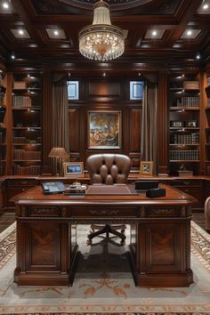 a large wooden desk sitting under a chandelier in a room filled with books