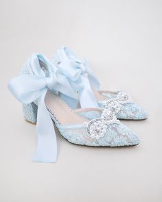 Crochet Lace Wedding Shoes Collection. Classic and refined almond toe crochet lace with added pearls applique. The luminous pearls makes this a classy and elegant shoe for any bride. Elaborate with matching long satin ribbons or sheer ribbons. Tie oversized bow around ankle to add dancerly grace on your special day.DETAILS:HEELS: 2.75 inchesUPPER: Synthetic upper and liningMATERIALS: Manmade outsoleORIGIN: Imported Wedding Shoes Lace, Elegant Shoes, Bride Shoes, Satin Ribbon, Blue Lace, Womens Flats, Formal Event, Crochet Lace, Wedding Shoes