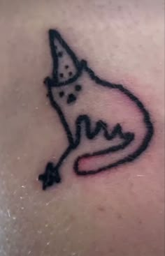 a small tattoo on the back of a woman's stomach with a cat in it