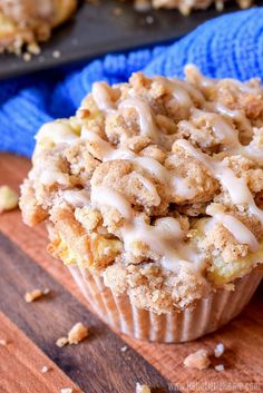 a close up of a muffin on a wooden table