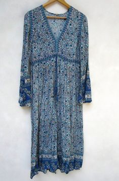 "ITEM DESCRIPTION women rayon maxi dress- with tassels floral print dress-full bell sleeve casual wear dress-long maxi style indian traditional dress Features : Long sleeve, V neck, Long dress Material : rayon crepe Fabric: 100% rayon soft light weight ethnic print fabrics Sleeve Length = 24inch For more sizes & their measurement, please refer our below chart to understand the sizes variations available with us For your size requirement, please mention your size in seller note at the time of Blue Bohemian Maxi Dress With Boho Print, Blue Printed Long Maxi Dress, Blue Maxi Dress For Festival, Blue Floor-length Maxi Dress For Festival, Blue Bohemian Maxi Dress, Blue Rayon Maxi Dress, Blue Flowy Rayon Maxi Dress, Flowy Blue Rayon Maxi Dress, Blue Floral Print Maxi Dress For Festival