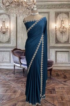 Beautiful peacock blue satin saree with stone work border and running blouse piece Peacock Blue Saree, Blue Satin Saree, Peacock Saree, Hamel Patel, Stone Work Saree, Farewell Saree, Unique Sarees, Farewell Sarees, Simple Saree Designs