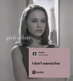 a woman holding a sign that says, i don't wanna to live?