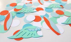 paper cut outs with circles and birds on them