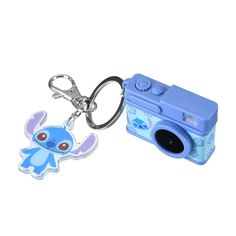 Exclusive "Sound & Light-up Camera" Keychain will be released at Japan Disney Store on July 4~! Fun action when you press the button. A camera-type key chain designed with Stitch and Scrump. Character-like hibiscus pattern camera. Despite its cute mini size, it has a powerful and unique mechanism that emits a flash and makes a shutter sound when the button is pressed! It is a playful item that looks like a real toy camera and the color of the flashlight is based on the image of the character. Size: Total length: approx. 12 (cm) Camera: length approx. 3.4 x width 5 x thickness 2 (cm) Character: length approx. 4.4 x width 3.5 x thickness 0.3 (cm) [Specifications]*Batteries are used up and cannot be replaced. Please note. Photo Credit: Japan Disney Store Stitch Items Disney, Airpods Case Stitch, Stitch Nintendo Switch Case, Disney Doorbells Stitch Toys, Camera Keychain, Disney Keychain, Lilo And Stitch Merchandise, Lilo And Stitch Drawings, Toy Camera