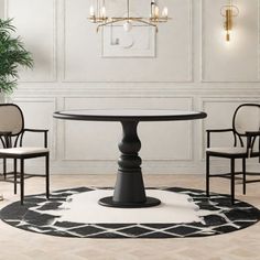 a dining room with chairs and a table in the center, surrounded by white walls