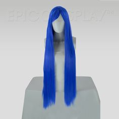 Persephone Dark Blue Long Straight Wig Our Persephone style Dark Blue Long straight wig boasts an impressive total of 40” in length. This style is long enough to reach the mid-back on someone who is 5’5’’, so be sure to take into consideration your own height to estimate where it will fall. This wig comes with 5” bangs perfect for wearing straight out of the bag. These bangs can be worn straight, side swept, or even cut and styled to suit your specific needs. A skintop at the crown of this wig m Dark Blue Wig, Blue Wigs, Long Straight Wig, Best Blouse Designs, How To Cut Bangs, Blue Wig, Epic Cosplay, Yellow Tone, Long Bangs