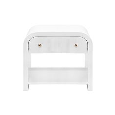 the side table is white and has two drawers on each side, one with gold knobs