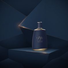 an image of a bottle of perfume on a dark background