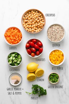 the ingredients for this healthy salad are arranged in bowls on a white marble countertop