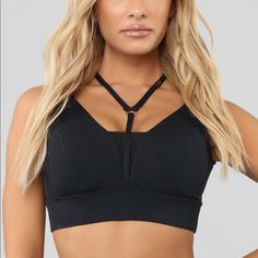 Fashion Nova Black Strappy Sports Bra. This Sports Bra Is Really Supportive And True To Size. Looks Great On And Not Uncomfortable At All. Brand New!! Black Sporty T-back Activewear, Sporty Crop Top With Straps For Gym, Sporty Crop Top With Straps For Workout, Black Stretch T-back Crop Top, Black Training Bra With Light Support, Sporty Black Bra For Gym, Casual Black T-back Activewear, Sporty Black Gym Bra, Black Tank Top For Yoga With Bust Support