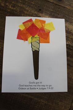 a piece of paper that has been made to look like a torch