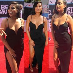 two women in black dresses on the red carpet at an awards event, one is showing off her cleavage