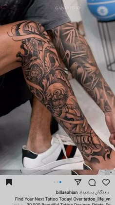 a man with tattoos on his arm and leg