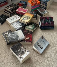 a pile of books laying on the floor