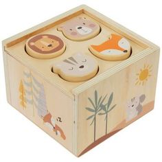 a wooden toy box with four different animal faces on it's lid and sides