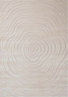 a beige rug with wavy lines on it