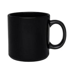 a black coffee mug sitting on top of a white table