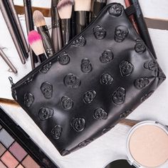 Mini Skulls Make Up Bag The cutest skull-embossed make up or travel bag! Faux leather with polyester lining, a zipper top and waterproof outer material. Product material: P.U. Vegan Leather. Product size: 8.9 x 4.9 x 6.9" (22.5 x 12.5 x 17cm.) Makeup Purse, Skull Lover, Skull Makeup, Pouch Organizer, Black Skulls, Novelty Items, Travel Cosmetic Bags, Makeup Pouch, Cosmetic Pouch