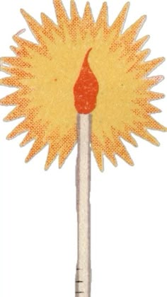 a needle with a yellow flower on it and a red dot in the middle,