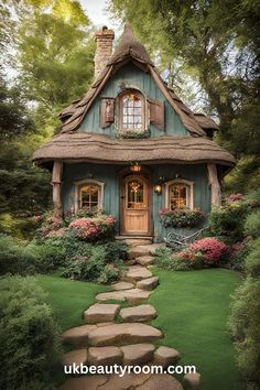 a small house with a stone pathway leading to it