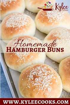 homemade hamburger buns on a baking sheet