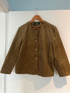 Embrace timeless style with this vintage women's collarless corduroy jacket by Orvis. Featuring a minimalist, collarless design and made from soft, durable corduroy, this jacket is the perfect addition to your fall wardrobe. Its versatile and classic look makes it ideal for layering over casual outfits or adding a touch of rustic charm to your everyday style. Brand: Orvis Material: Corduroy Style: Collarless, minimalist design Condition: Excellent vintage condition Color: Tan Size: 12 (please inquire on measurements) A classic and cozy piece, this Orvis jacket embodies effortless style and practicality. Whether you're out for a country walk or heading into the city, it's a must-have for lovers of vintage and timeless fashion. Fall Coats For Women, Fall Fashion Women, Autumn Coats, Fall Wardrobe Essentials, Outfit Vintage, Fall Coat, Fall Jackets, Corduroy Jacket, Mode Vintage