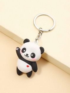 a key chain with a panda bear on it