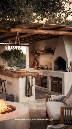 Embrace the beauty of nature with rustic outdoor kitchen ideas that offer both comfort and style. Whether you prefer a stone barbecue area or a wooden island, these ideas provide a warm, inviting space for cooking and relaxation. Combine natural materials like wood, stone, and metal for a timeless look, and integrate seating and lighting for evening gatherings. This rustic kitchen setup allows you to enjoy nature without compromising on comfort. Outdoor Kitchen Italy, Outside Barbecue Area Ideas, Outdoor Kitchens Ideas, Stone Barbecue, Retreat Business, Rustic Outdoor Kitchen, Rustic Outdoor Kitchens, Wooden Island, Kitchen Setup