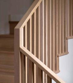 wooden stairs and railings in a home