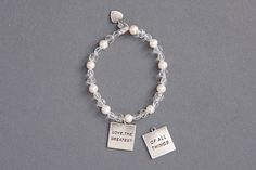 This bracelet has a reversible charm that says "Love, The Greatest Of All Things".  $24.99 Bracelet Making, Crystal Beads, Freshwater Pearls, Silver Bracelet