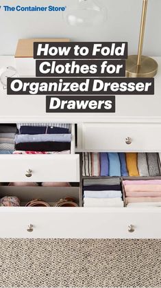 the drawer is open and there are many folded clothes in it on top of the dresser