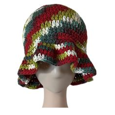 a crocheted hat is on top of a mannequin's head