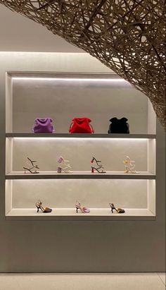 a display case filled with different types of shoes