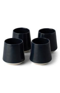 Hand-finished in Portugal's Tagus Valley from locally sourced recycled clay, these one-of-a-kind cups are double-fired for everyday durability. Set of four cups 3" x 3.6" 0.64 lb. Ceramic/glass Dishwasher safe Made in Portugal Black Coffee Mug 6oz, Cupping Set, Mug Cup, Midnight Blue, Dishwasher Safe, Recycling, Ceramics, Glass, Blue