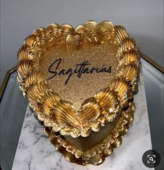 there is a heart shaped box with the word safframs written on it