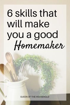 a white pitcher filled with kitchen utensils on top of a wooden table next to a