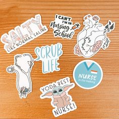 various stickers on a wooden surface with the words scrub life, you're best nurse