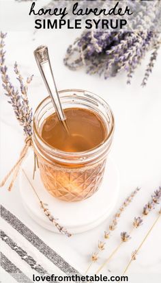 honey lavender simple syrup in a jar with a spoon