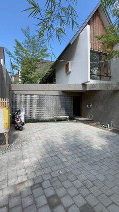 a motorcycle parked in front of a house