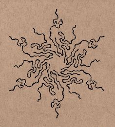 an abstract drawing on brown paper with black lines in the shape of a snowflake