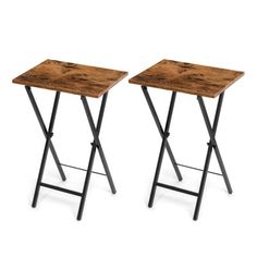 two small wooden tables with metal legs on each side, one is brown and the other is black