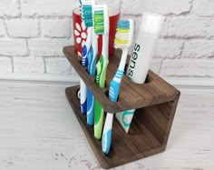 there are many toothbrushes in the holder