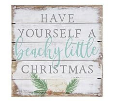 a wooden sign that says have yourself a beachy little christmas