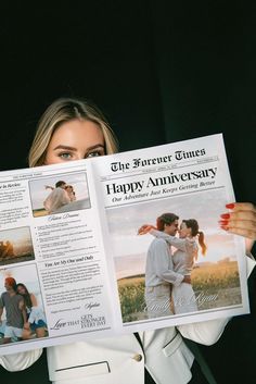 a woman is holding up a happy anniversary newspaper with pictures on the front and back