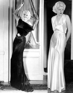 two women in evening dresses standing next to each other