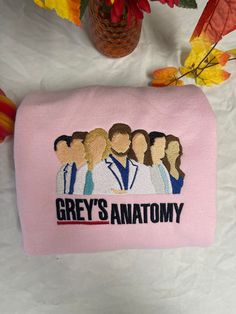 the grey's anatomy embroidered on a pink pouch