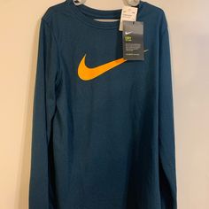 Brand New With Tags Nothing Wrong With It Nike Long Sleeve T-shirt For Spring, Nike Tops With Letter Print For Fall, Sports Long Sleeve Shirt With Letter Print, Long Sleeve Sports Shirt With Letter Print, Nike Long Sleeve Tops With Letter Print, Blue Long Sleeve T-shirt For School, Nike Winter Graphic Print Tops, Nike Winter Tops With Graphic Print, Nike Graphic Print Tops For Winter